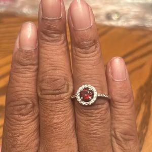NWOT WOMEN NO BRAND GARNET AND FAUX DIAMOND CIRCLE ENGAGEMENT RING.
